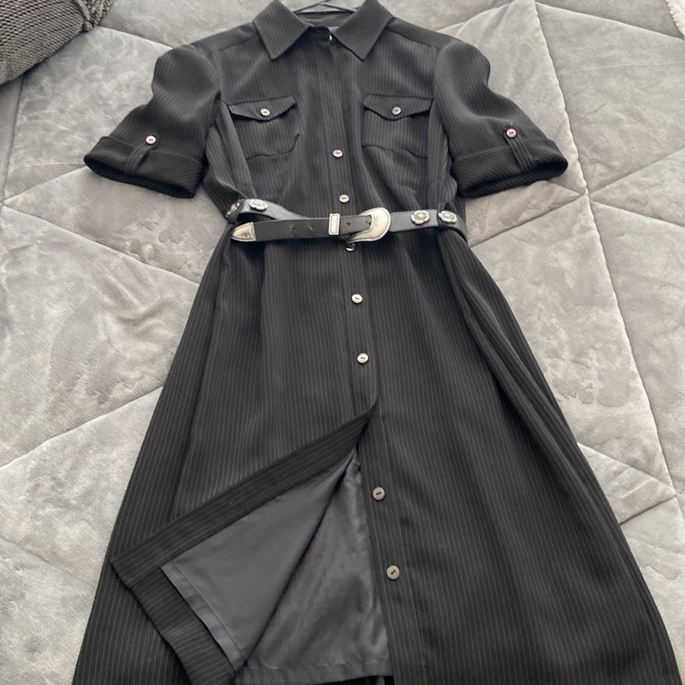 Tahari shirt dress fully lined. Completely buttoned from top to bottom.